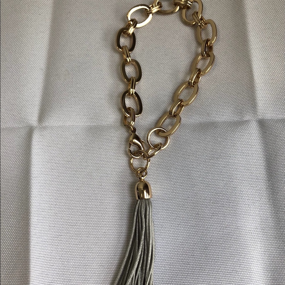 - Bracelet with tassel. Gold Tone chain